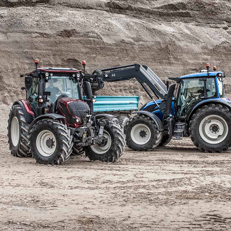 two valtra n4 series tractors working with frontloader