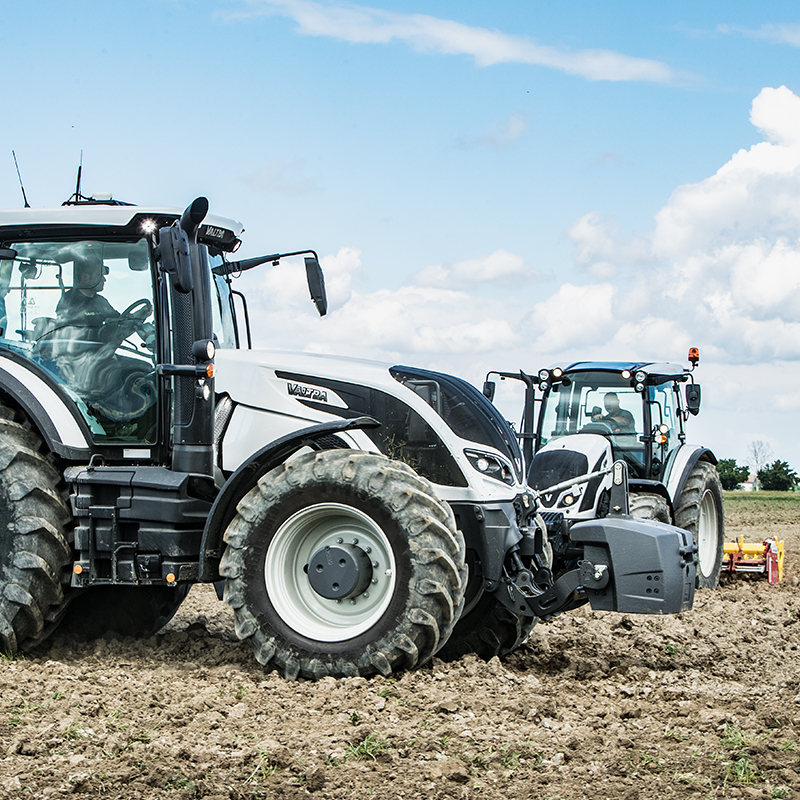 Valtra tractors on field