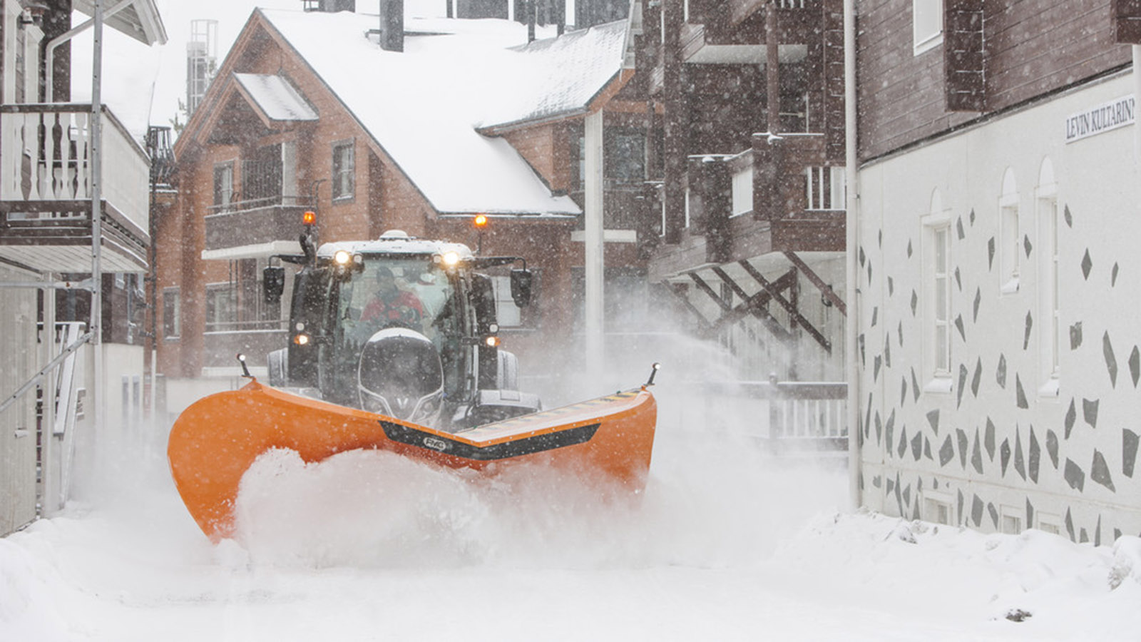 valtra unlimited customised tractor t series with snow plough in city