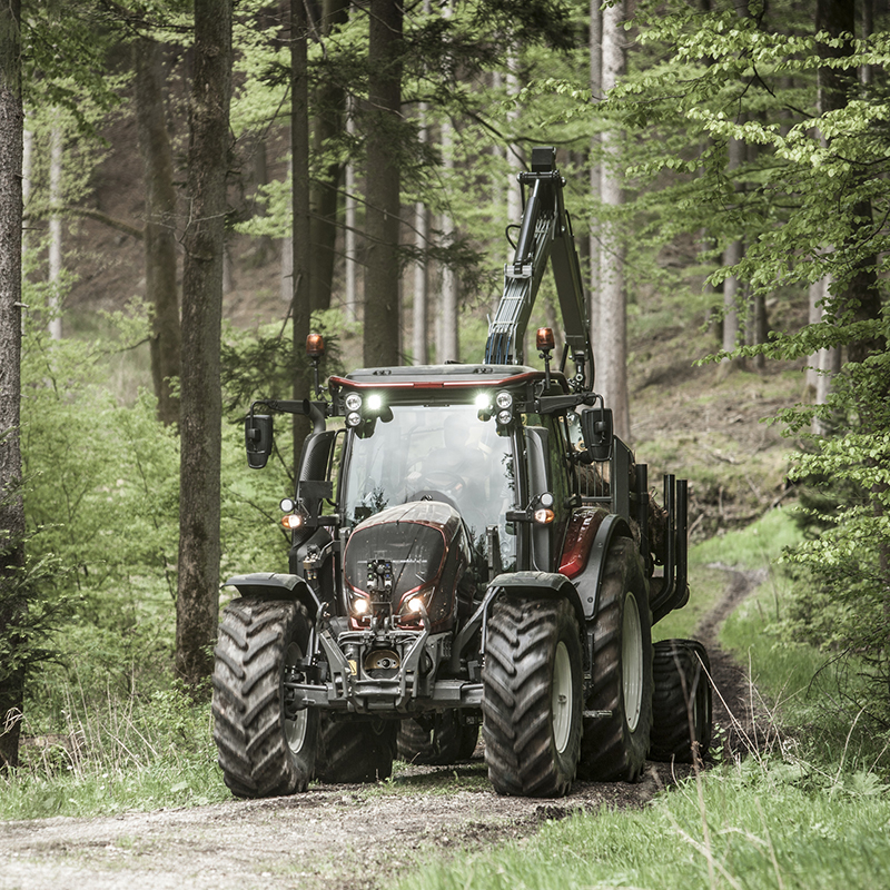 valtra unlimited custom tractor at forestry work