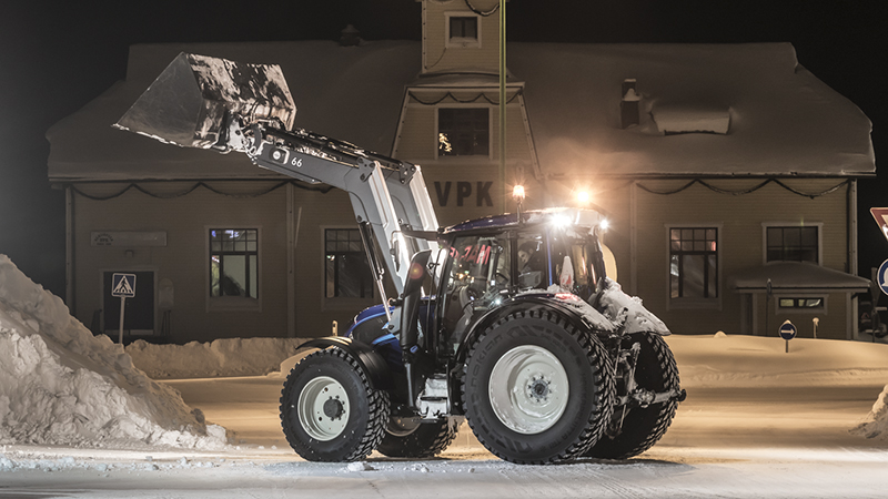 valtra unlimited customised tractor with track at the alps at snow work
